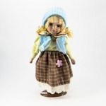 Порцеланова кукла момиче с шапка и елек 